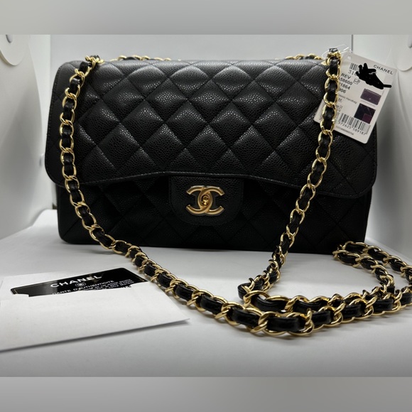CHANEL Handbags - Chanel Classic Flap in caviar gold hardware. Color: Black